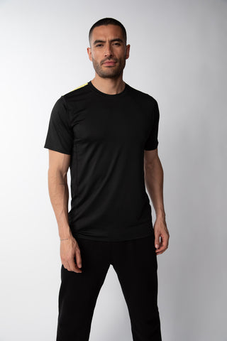 Polera deportiva cortes Hombre - Negro/Amarillo