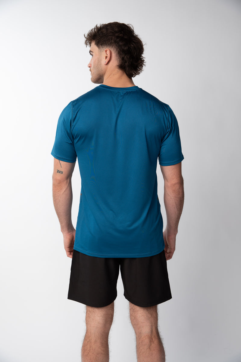 Polera deportiva estampada Hombre - Azul Petroleo